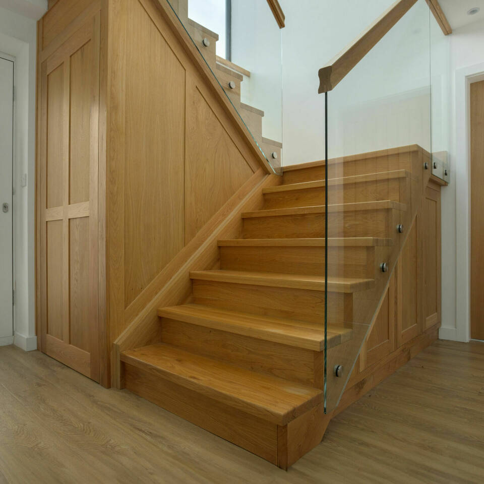 Contemporary Glass and Oak Staircase with Integrated Storage