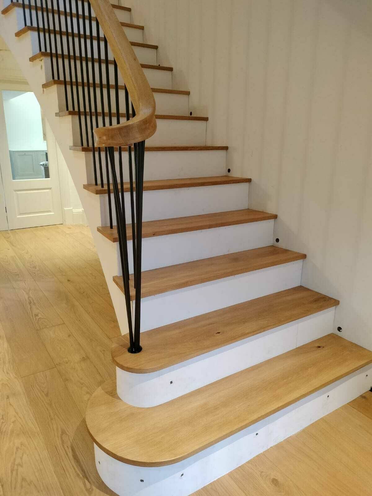 Concrete Staircase with Oak Treads, Black Metal Spindles & Oak Handrail