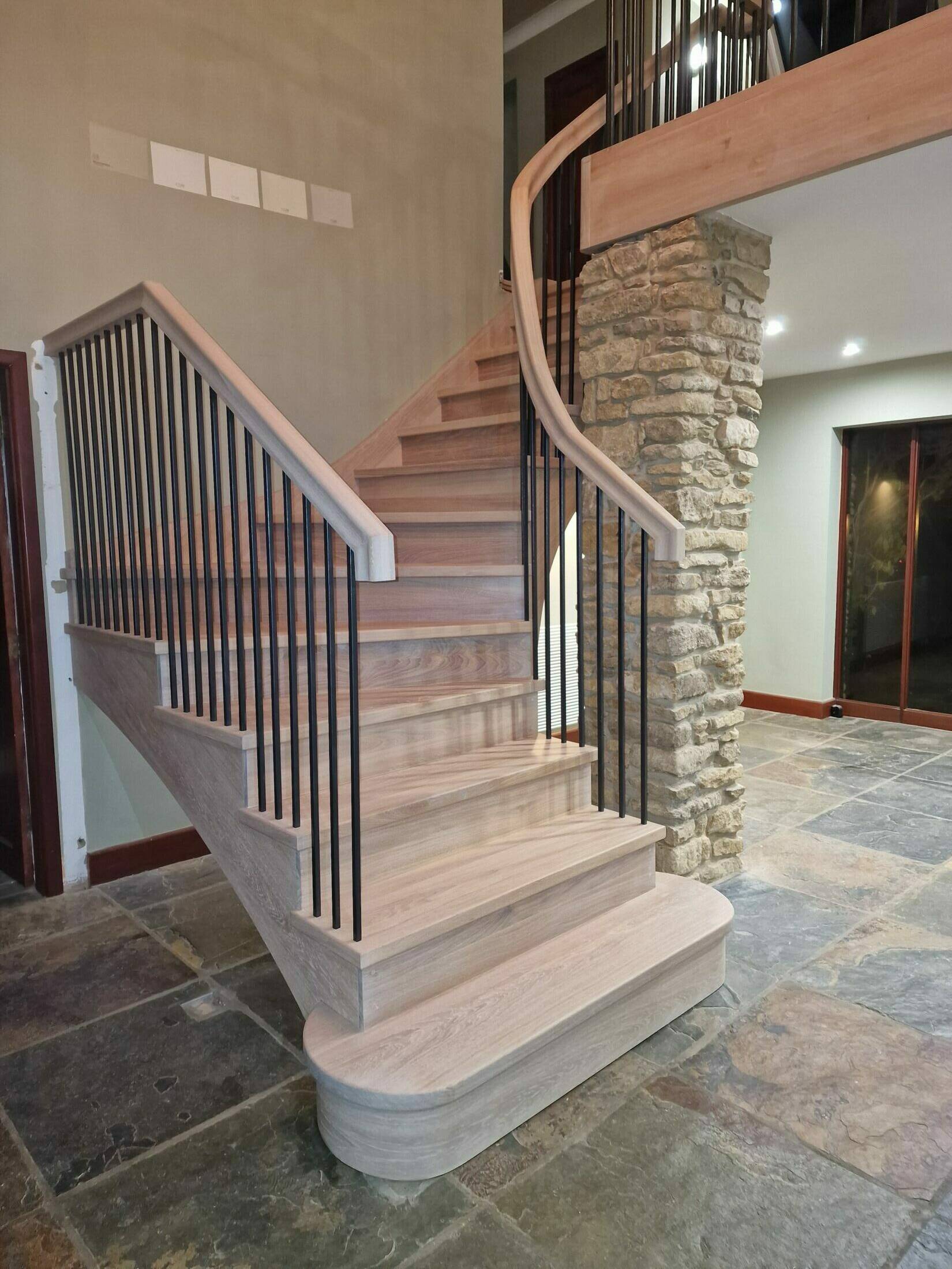 Curved Solid Oak Staircase Finished in White Oil