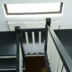 Modern Oak Clad, Black-Stained Concrete Staircase4