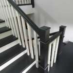 Modern Oak Clad, Black-Stained Concrete Staircase
